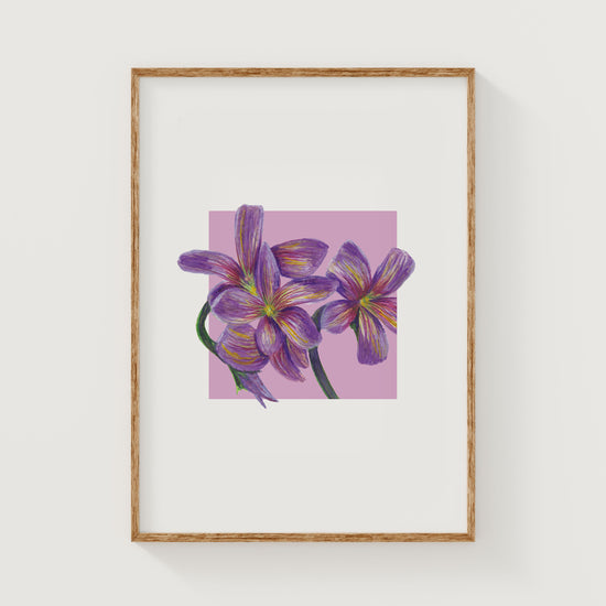 Framed artwork of purple flowers on a pink square background